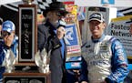 Carl Edwards, right, smiled while being interviewed by track announcer Tom Taylor after winning a NASCAR Sprint Cup Series race on Sunday in Bristol, 
