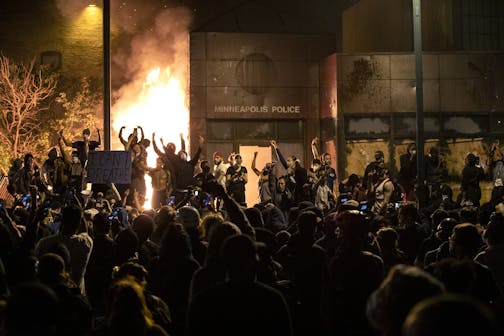 The Minneapolis Third Police Precinct state was set on fire during a third night of protests following the death of George Floyd while in Minneapolis police custody, on Thursday, May 28, 2020.