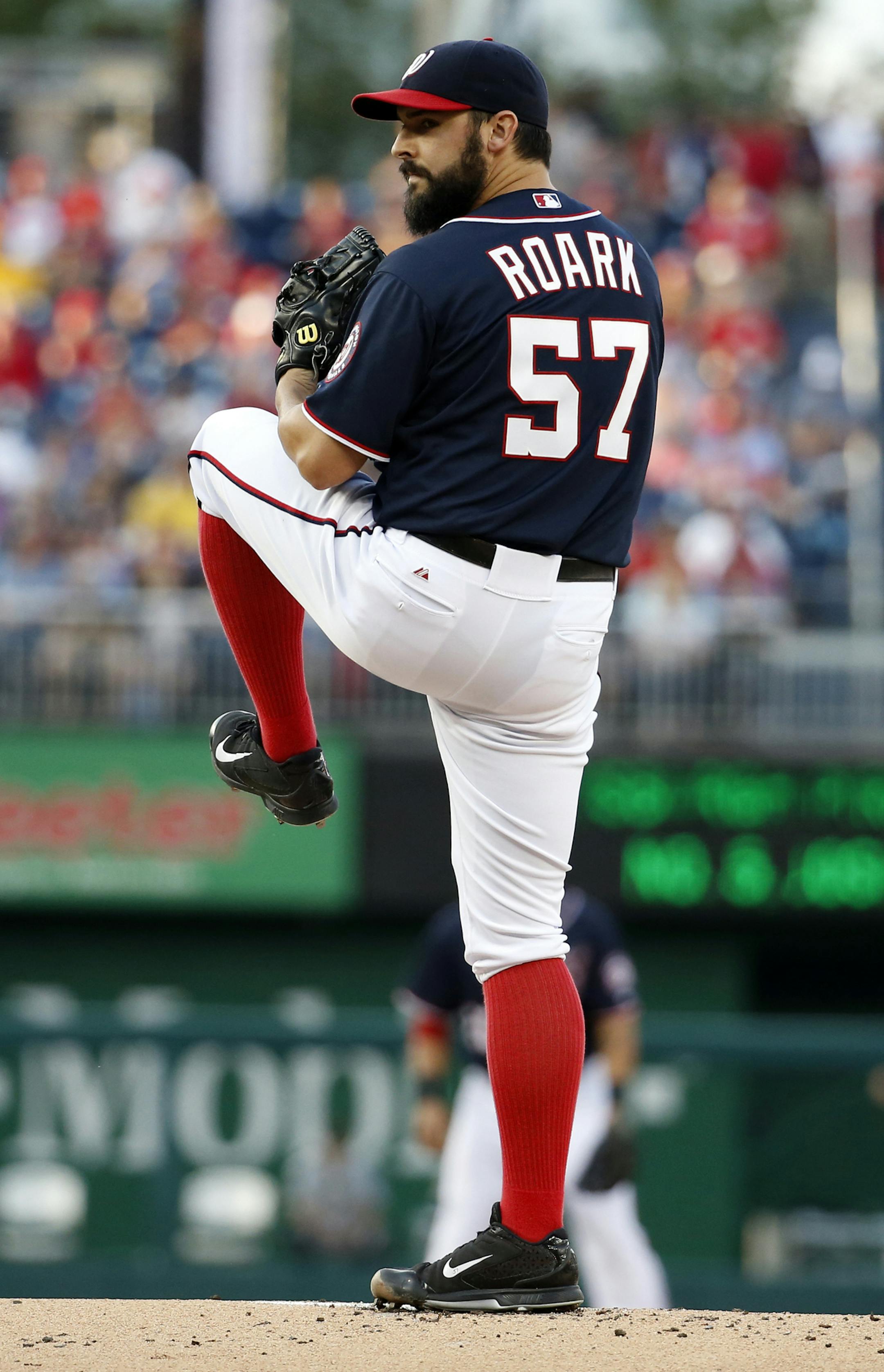 Washington Nationals starting pitcher Tanner Roark throws during the first inning of a baseball game against the Pittsburgh Pirates at Nationals Park, Friday, Aug. 15, 2014, in Washington. (AP Photo/Alex Brandon) ORG XMIT: NYOTK