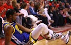 Kevin Durant (35) of the Golden State Warriors reacts after sustaining an injury during the second quarter against the Toronto Raptors during Game Fiv