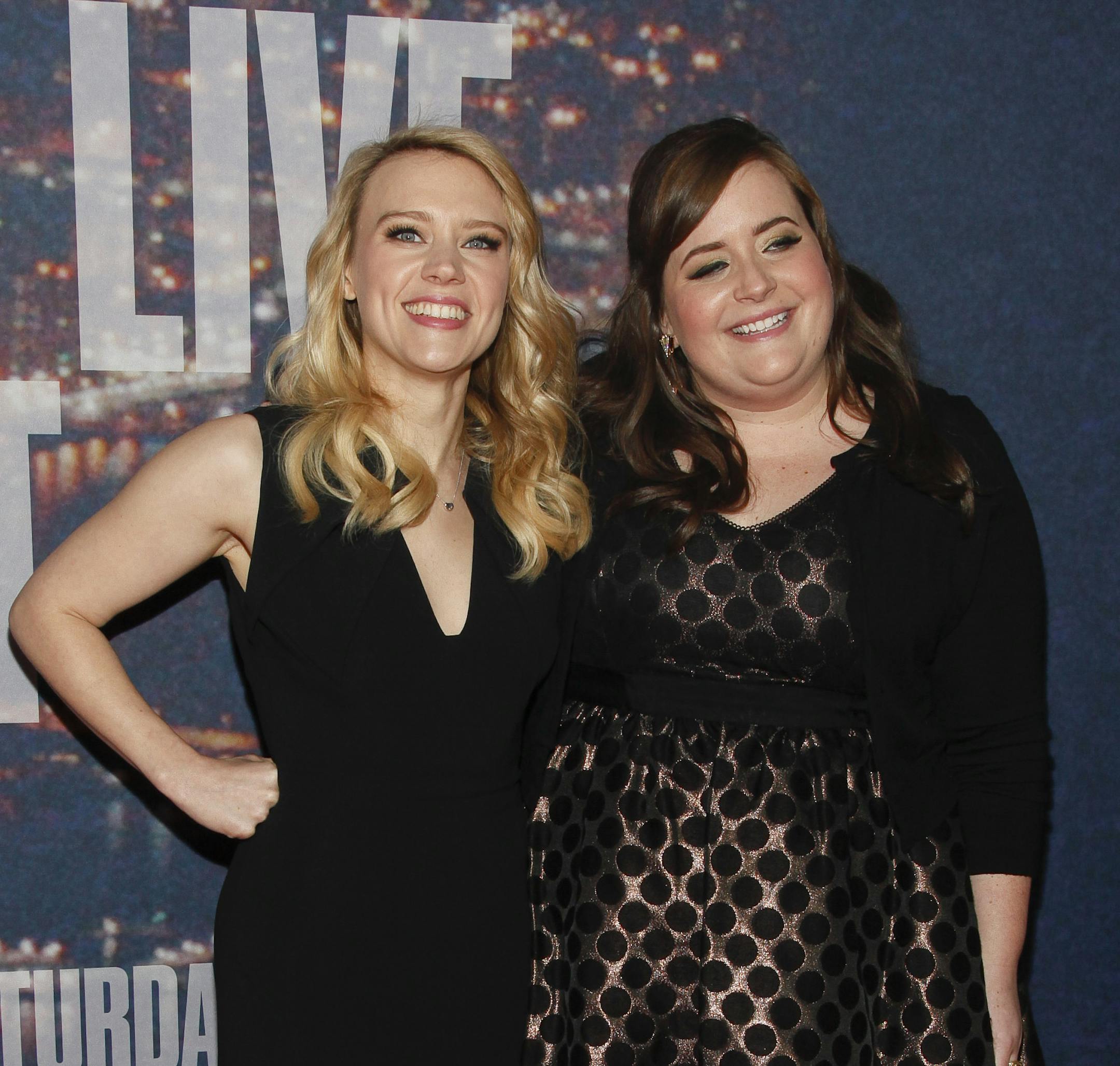 Kate McKinnon, left, and Aidy Bryant, right, attend the SNL 40th Anniversary Special at Rockefeller Plaza on Sunday, Feb. 15, 2015, in New York. (Photo by Andy Kropa/Invision/AP) ORG XMIT: INVW