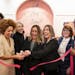 The Coven co-founders Alex West Steinman, from left, Bethany Iverson, Erinn Farrell, and Liz Giel cut the pink ribbon with former Minnesota House Majo