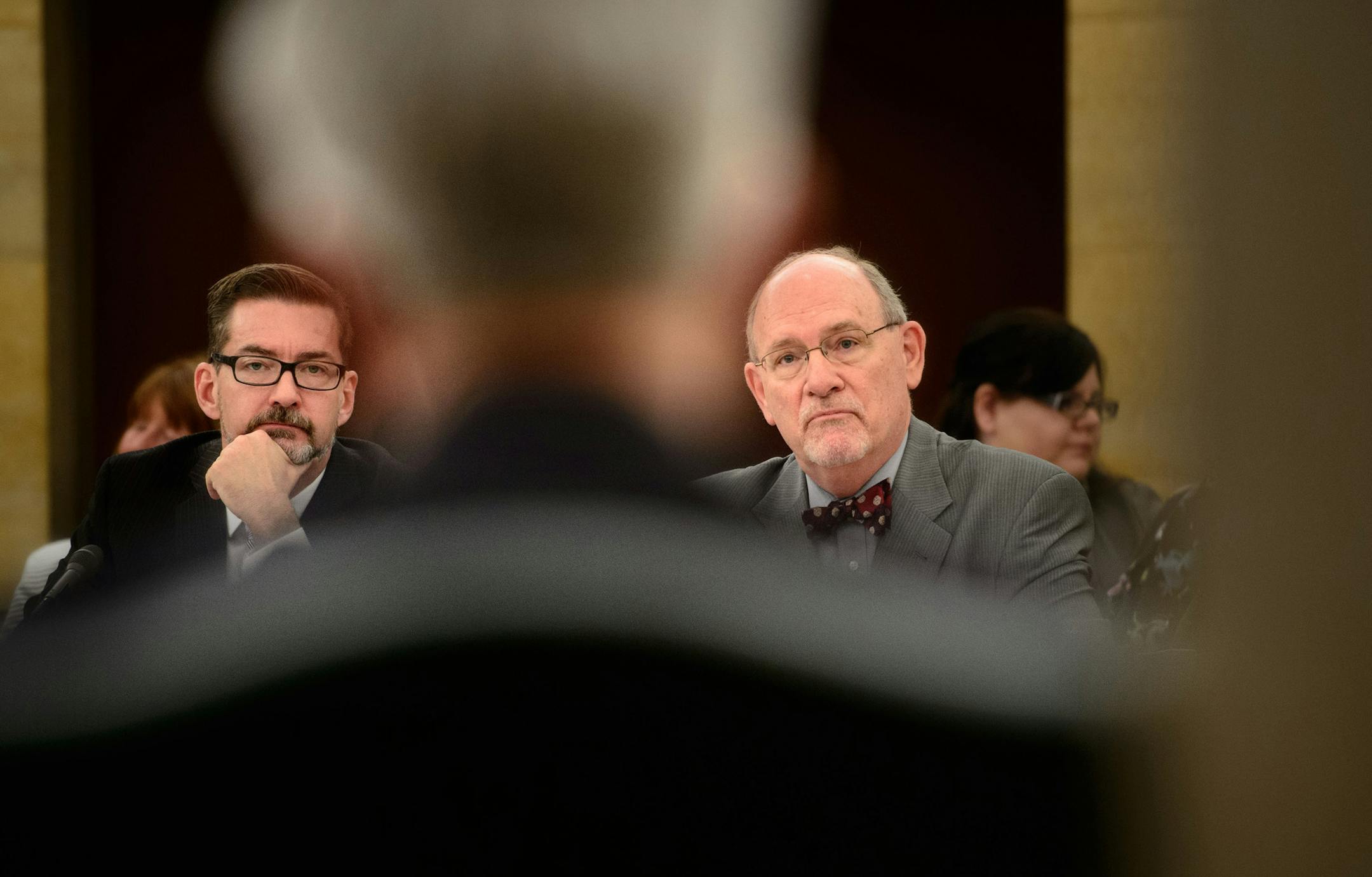 Sen. Scott Dibble, left, is the bill’s sponsor in the Senate, where the measure was revived after pressure from Gov. Mark Dayton. But Dr. Ed Ehlinger, right, Dayton’s health commissioner, testified Thursday that the proposal was “a risky shortcut.”
