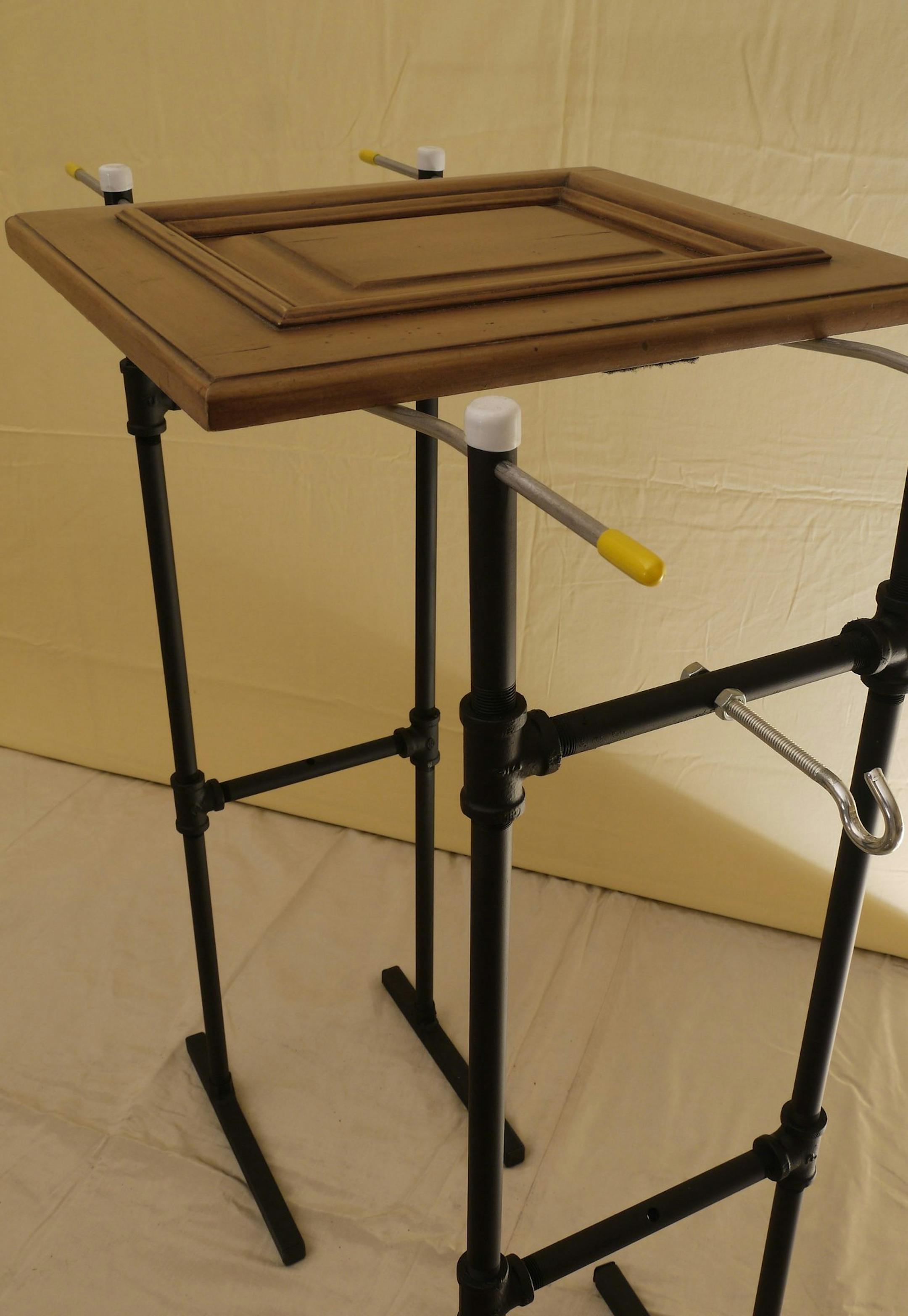 The Door Rack Painter is a system of racks that enables someone to paint a door on both sides and store wet doors until they dry. (Akron Beacon Journal/MCT) ORG XMIT: 1147857