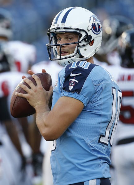 Tennessee Titans quarterback Jake Locker (10) works before the first half of an NFL preseason football game against the Atlanta Falcons, Saturday, Aug