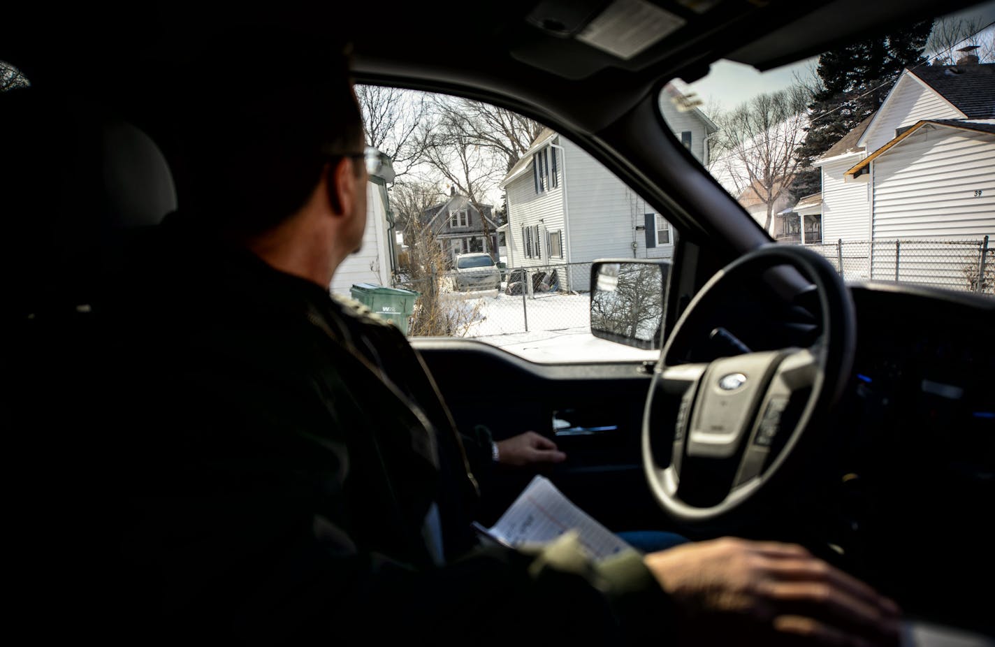 Bruce Meager of the fugitive apprehension unit of the Minnesota Department of Corrections staked out the home of a parole violator to look for movement. ] GLEN STUBBE * gstubbe@startribune.com Wednesday, February 18, 2015 Minnesota Department of Corrections is looking for an additional $1.2 million from Gov. Mark Dayton's budget to boost its Fugitive Apprehension Unit.EDS, FACES ARE NOT TO SHOW IN THESE PHOTOS. DO NOT LIGHTEN IN POST PRODUCTION.