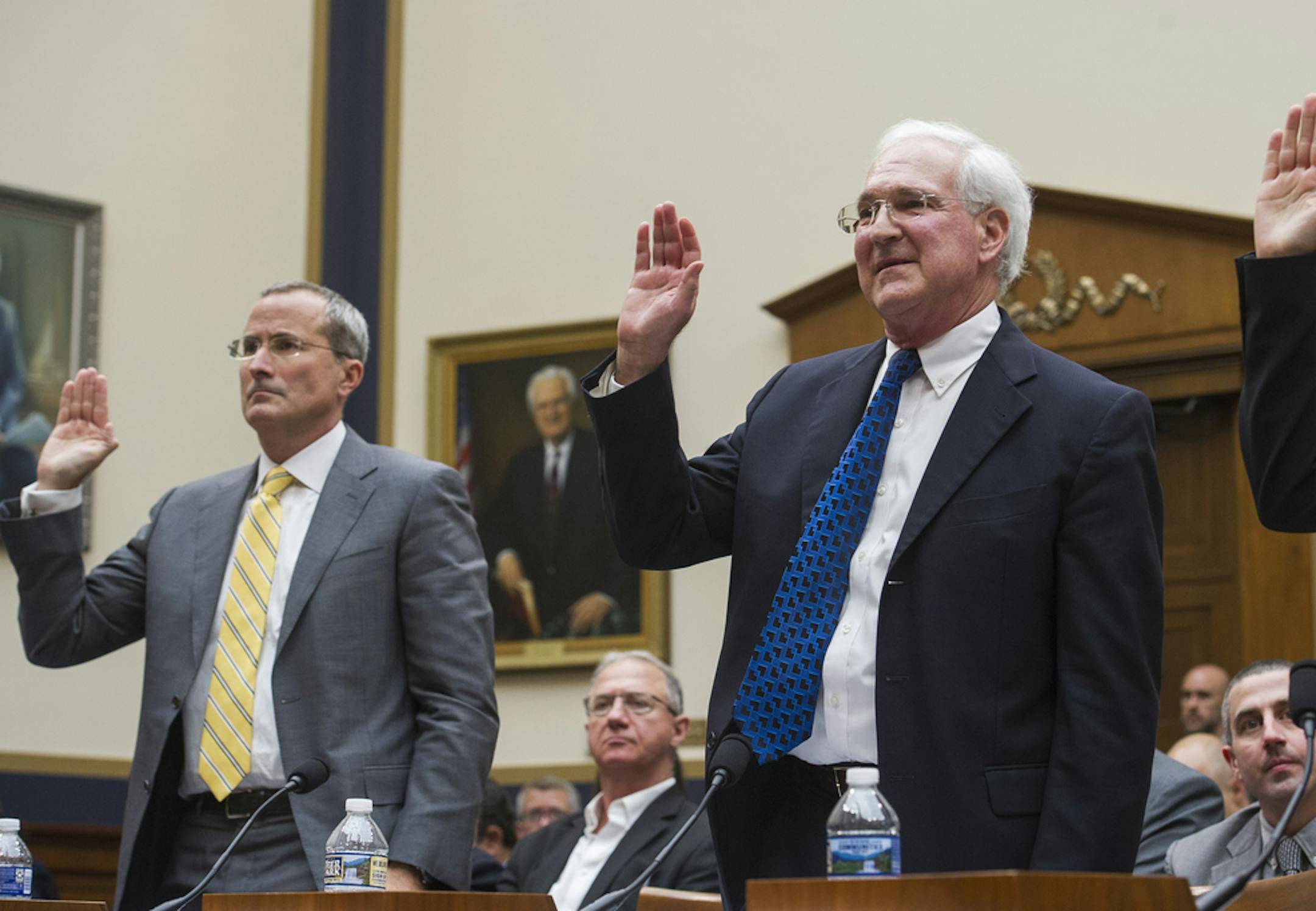 David Chavern, president of News Media Alliance, left, and Gene Kimmelan, president of Public Knowledge, are sworn-in to testify before the House Judiciary Antitrust subcommittee hearing on 'Online Platforms and Market Power', on Capitol Hill in Washington, Tuesday, June 11, 2019. (AP Photo/Cliff Owen)