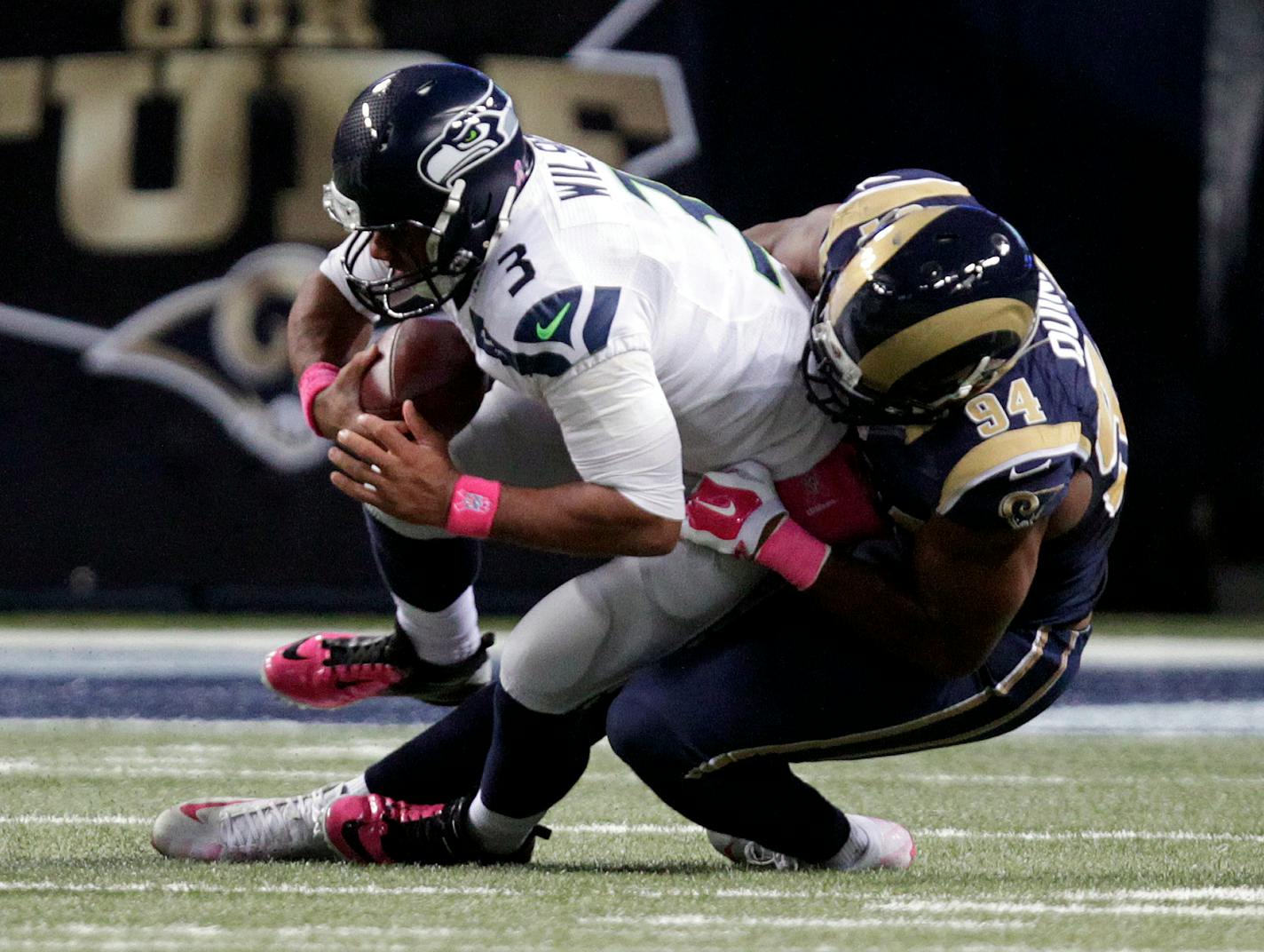 Seahawks quarterback Russell Wilson was sacked by the Rams' Robert Quinn on Oct. 19, when St. Louis won to drop the defending Super Bowl champions to 3-3.