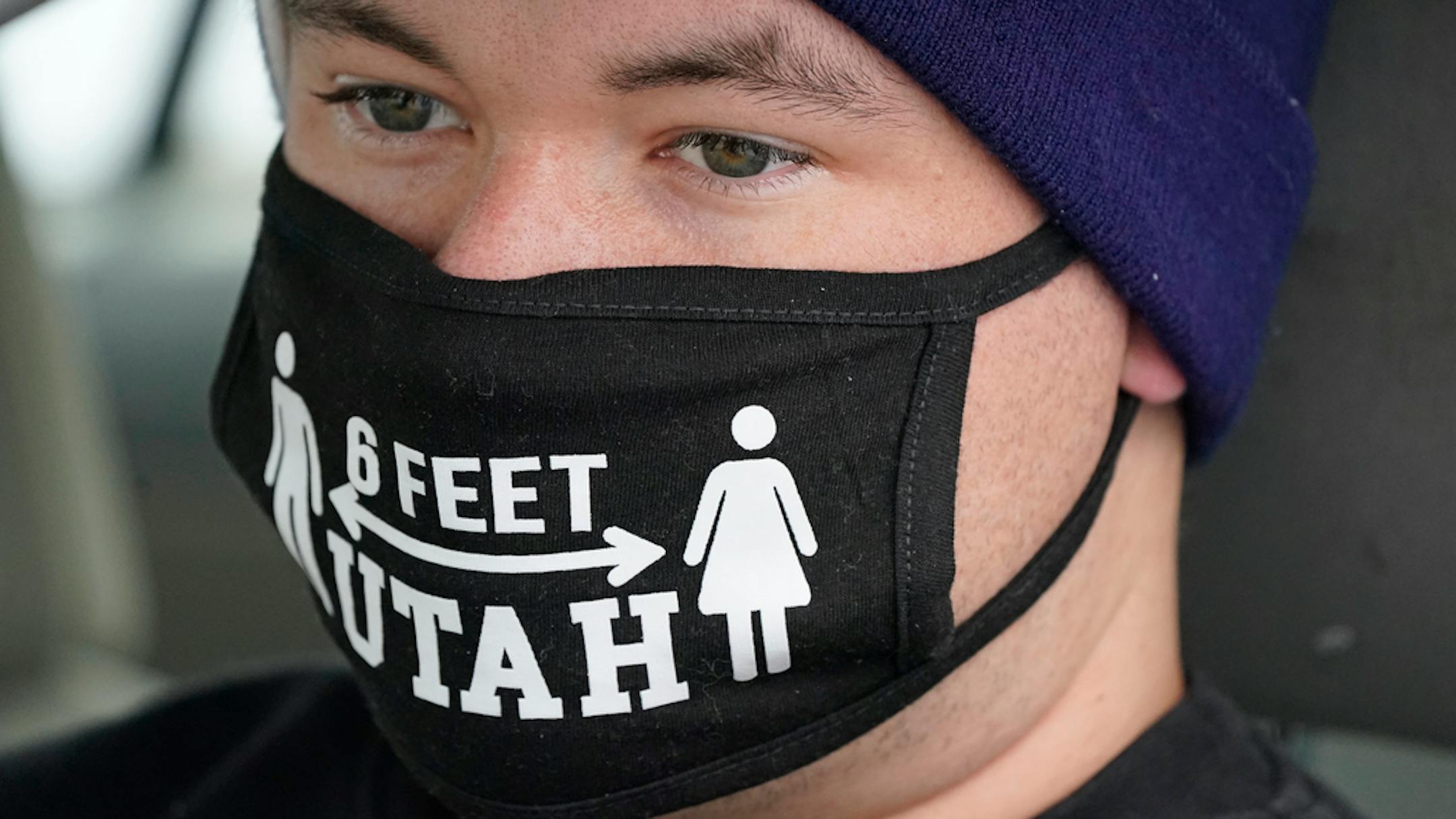 FILE - In this Nov. 10, 2020, file photo, Jon O'Brien sits at the Utah National Guard's mobile testing site for COVID-19 in Salt Lake City. The U.S. has recorded about 10.3 million confirmed infections, with new cases soaring to all-time highs of well over 120,000 per day over the past week. (AP Photo/Rick Bowmer, File)
