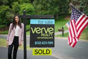 Realtor Mitra Rahimi stands in front an Eden Prairie home that sold in two days after having 28 showings and receiving eight offers.