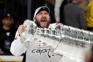 Washington Capitals left wing Alex Ovechkin, of Russia, hoists the Stanley Cup after the Capitals defeated the Golden Knights in Game 5 of the NHL hoc