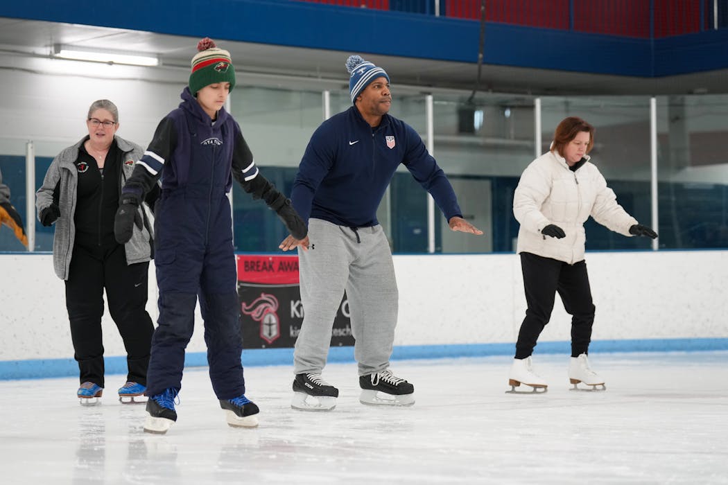 Stephanie Stover, right, said she feels like a first-timer even though she enjoyed ice skating as a young girl in her native France. She’s one of a handful of adult beginners taking Saturday lessons at the New Hope Ice Arena.