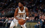 Guard Malik Beasley is one of the four players coming to the Wolves.
