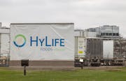 HyLife Foods employees makes their way to the second shift last year at the pork processing plant in Windom. The company in 2021 received a willful vi
