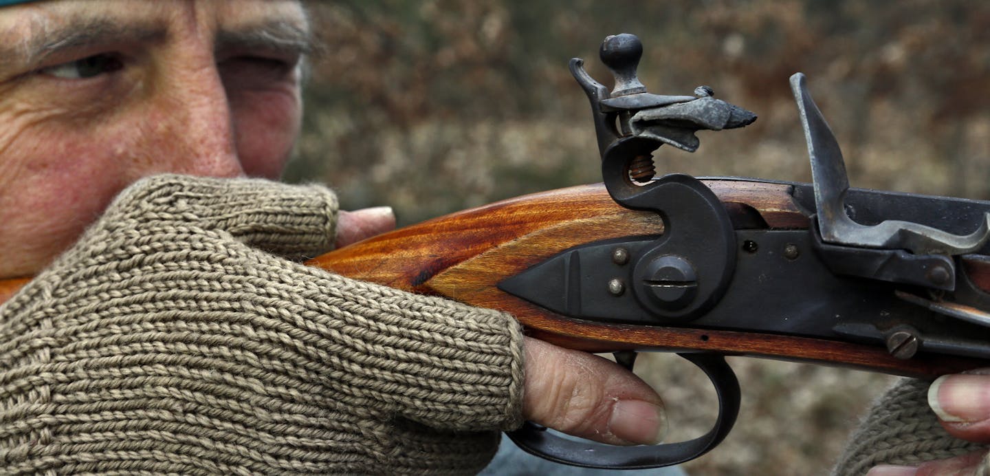 Muzzleloader enthusiast Jim Townsend of Andover firing a model of early 1800's southern mountain rifle. (MARLIN LEVISON/STARTRIBUNE(mlevison@startribune.com)