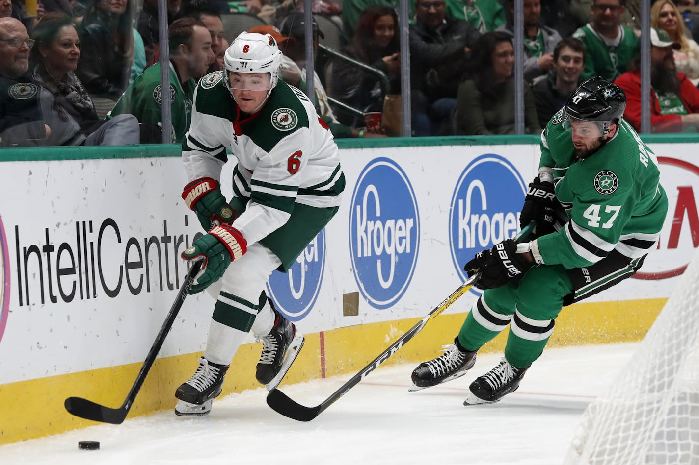 Minnesota Wild center Ryan Donato (6) controls the puck as Dallas Stars right wing Alexander Radulov (47) gives chase in the second period of an NHL hockey game in Dallas, Tuesday, Oct. 29, 2019. (AP Photo/Tony Gutierrez)