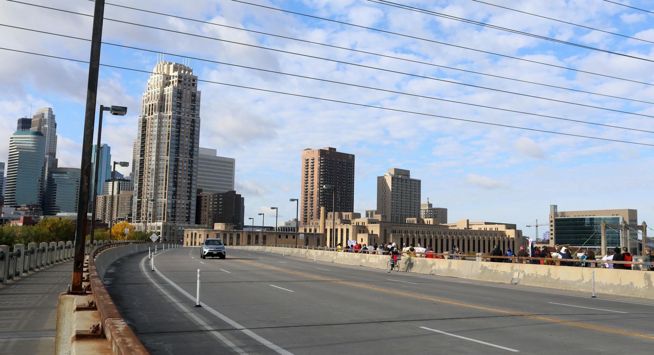 Members of Education Minnesota, the state teachers' union, rallied at the Minneapolis Labor Union office before marching downtown for early voting Friday, Oct. 19, 2018, in Minneapolis, MN. Here, educators and other union members cross the Third Avenue Bridge on their way to early voting.] DAVID JOLES &#x2022; david.joles@startribune.com The November election is a particularly high-stakes one for Education Minnesota, the powerful teachers' union that's facing considerable challenges from outside