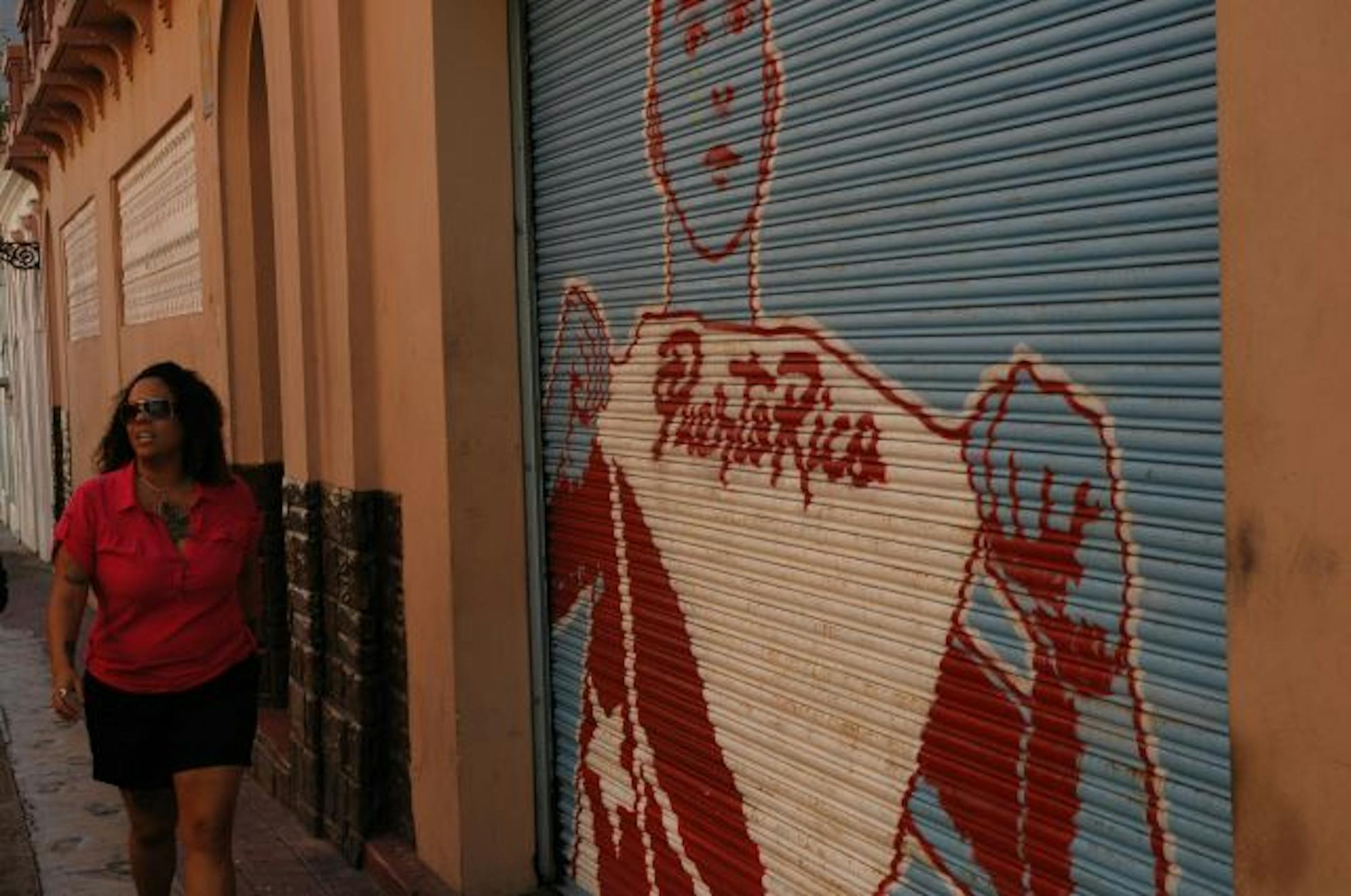 THe streets of Old San Juan are a mix of beautiful Spanish Colonial architecture and raw street life.