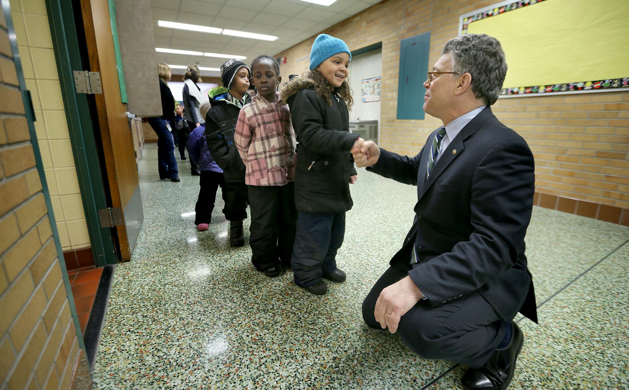 U.S. Sen. Al Franken (D-Minn.) greeted kids making their way to eat lunch at Meadow Lake Elementary School, Monday, March 17, 2014 in New Hope, MN. ] (ELIZABETH FLORES/STAR TRIBUNE) ELIZABETH FLORES • eflores@startribune.com