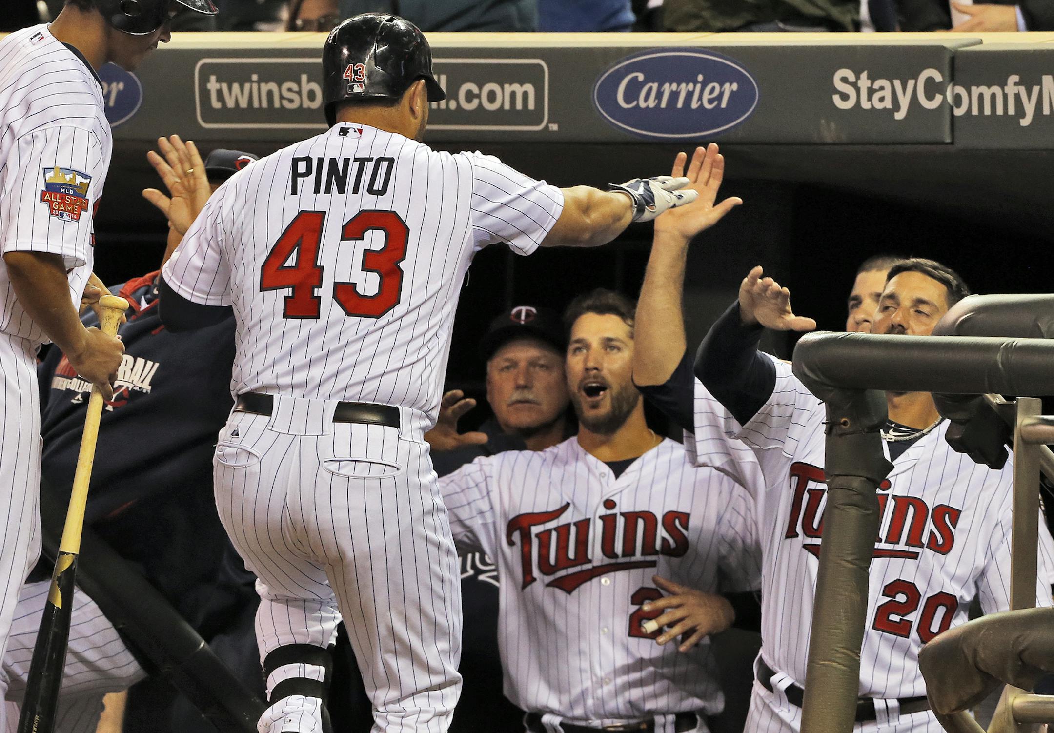 Twins Josmil Pinto was welcomed back to the dugout after he hit a home run in the 4th inning. ] Twins vs. Kansas City. (MARLIN LEVISON/STARTRIBUNE(mlevison@startribune.com)