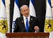Israeli Prime Minister Benjamin Netanyahu gives a speech during a ceremony on the eve of the Memorial Day for fallen soldiers (Yom HaZikaron), at the 