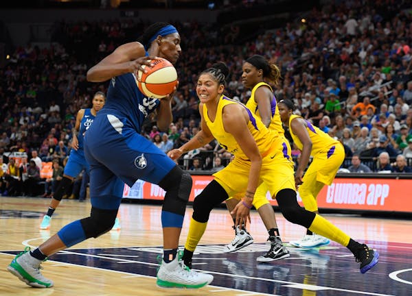 Lynx center Sylvia Fowles, left, averaged 17.7 points and 11.9 rebounds per game this season. The player guarding her, Sparks forward/center Candace P