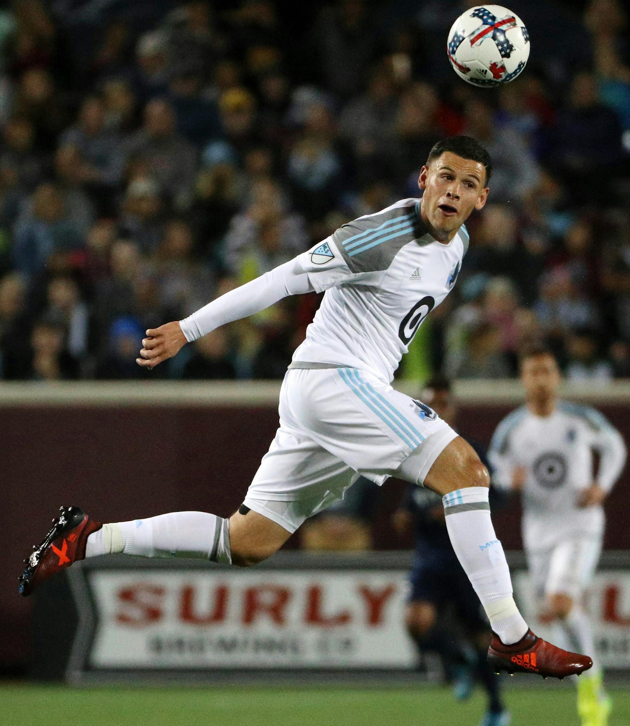 Minnesota United forward Christian Ramirez (21) headed the ball in the first half. ] ANTHONY SOUFFLE &#xef; anthony.souffle@startribune.com Game action from an MLS match between the Minnesota United and the Sporting Kansas City Saturday, Oct. 7, 2017 at TCF Bank Stadium in Minneapolis.