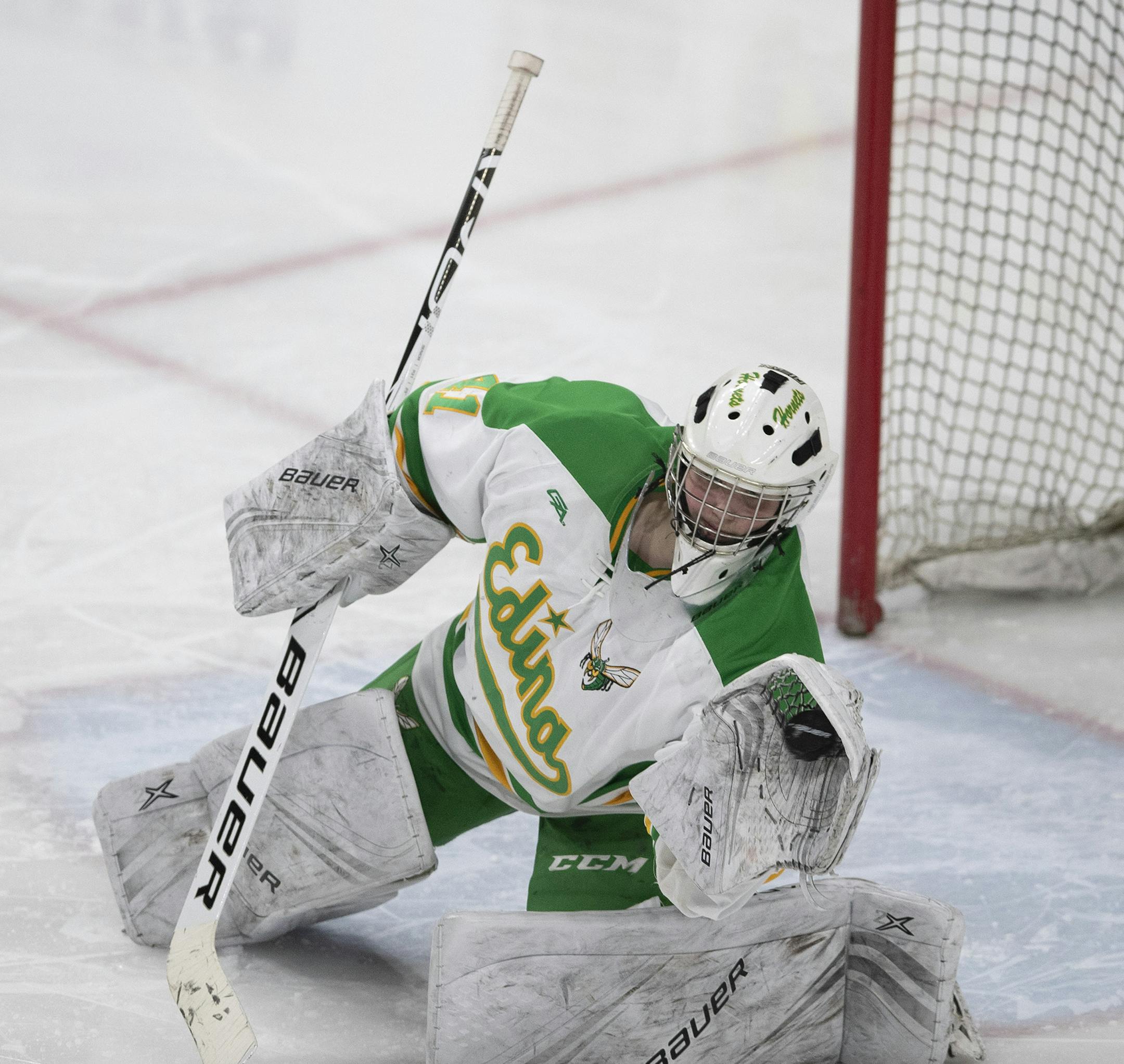 Edina goalkeeper Uma Corniea stop a shot in the third period .] Jerry Holt •Jerry.Holt@startribune.com Edina defeated Maple Grove 3-0 in 2A girls' hockey semifinal at Xcel Energy Center February 21, 2020 in St. Paul, MN.