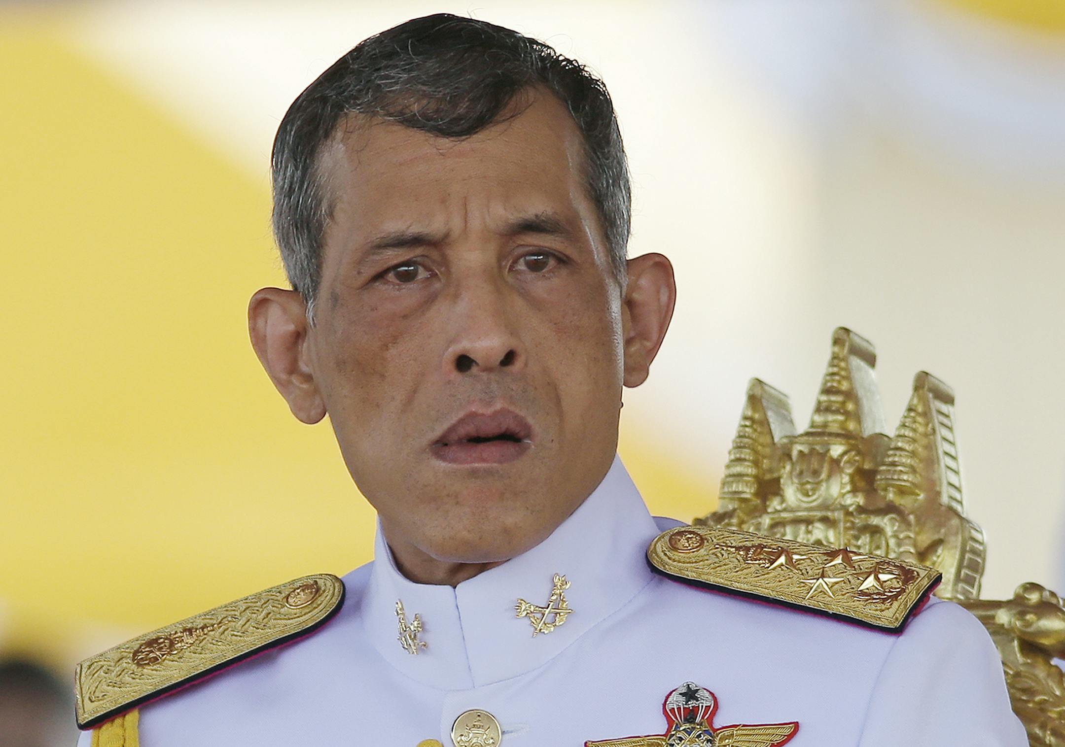 In this May 9, 2016, photo,Thailand's Crown Prince Vajiralongkorn is seated at the royal plowing ceremony in Bangkok. Thailand's Royal Palace said on Thursday, Oct. 13, 2016, that Thailand's King Bhumibol Adulyadej, the world's longest reigning monarch, has died at age 88. (AP Photo/Sakchai Lalit) ORG XMIT: BKCD705