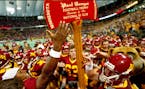 The Gophers football team lifted up Paul Bunyan's Axe in 2003 after Rhys Lloyd's field goal.