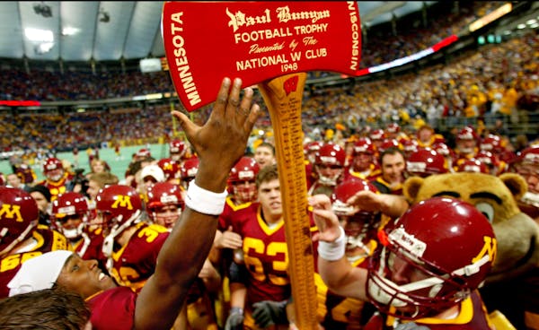 The Gophers football team lifted up Paul Bunyan's Axe in 2003 after Rhys Lloyd's field goal.
