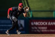 Twins third baseman Royce Lewis fields a grounder during spring training in Fort Myers, Fla.