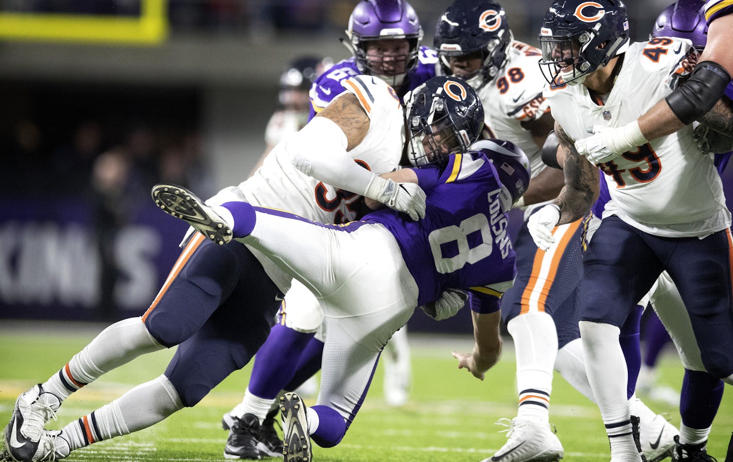 Chicago Bears defensive end Roy Robertson-Harris (95) hit Minnesota Vikings quarterback Kirk Cousins (8) late in the forth quarter at U.S. Bank Stadium Sunday December 30, 2018 in Minneapolis , MN.] The Minnesota Vikings lost to the Chicago Bears 24-10 at U.S. Bank Stadium. Jerry Holt &#x2022; Jerry.holt@startribune.com