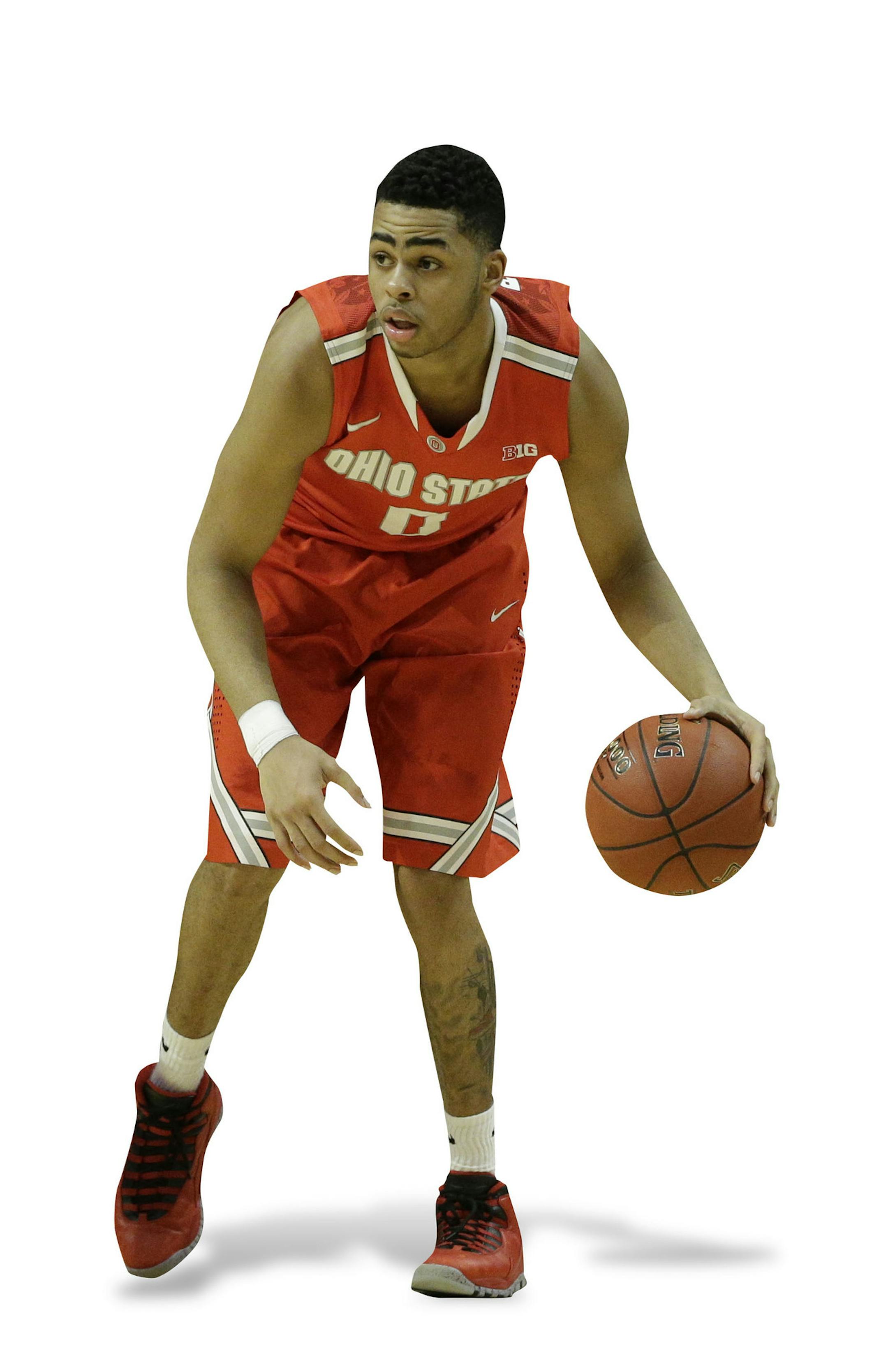 Ohio State's D'Angelo Russell (0) looks to pass around Michigan State's Lourawls Nairn Jr. (11) in the first half of an NCAA college basketball game in the quarterfinals of the Big Ten Conference tournament in Chicago, Friday, March 13, 2015. (AP Photo/Nam Y. Huh) ORG XMIT: ILMC15