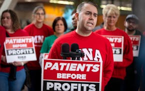 Jeremy Olson-Ehlert, a nurse and MNA co-chair at HCMC, spoke during a news conference ahead of a meeting in which the MNA and other groups called for