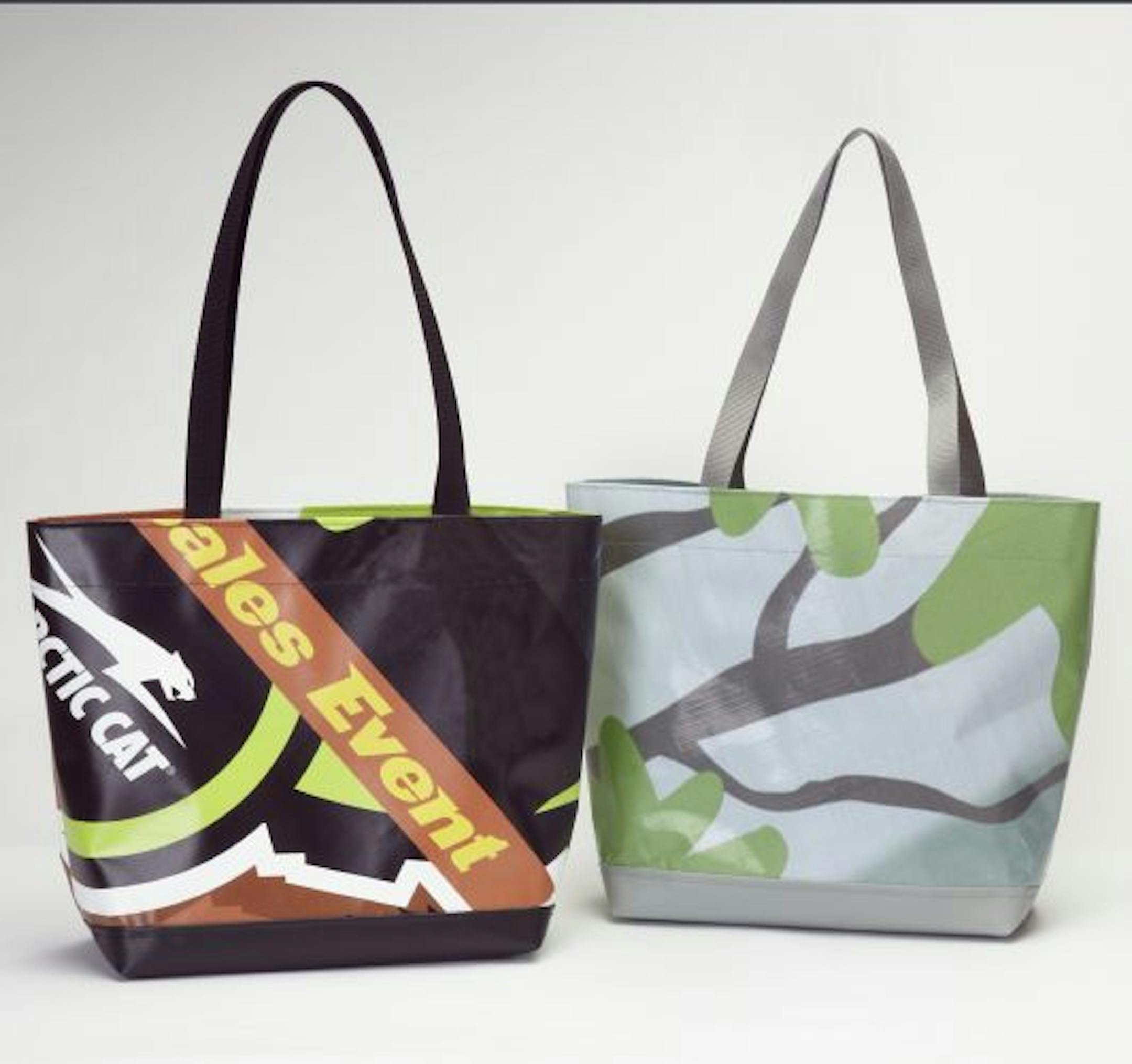 Tote bags made from old vinyl billboards and banners by Gail and Jeff Greengard.