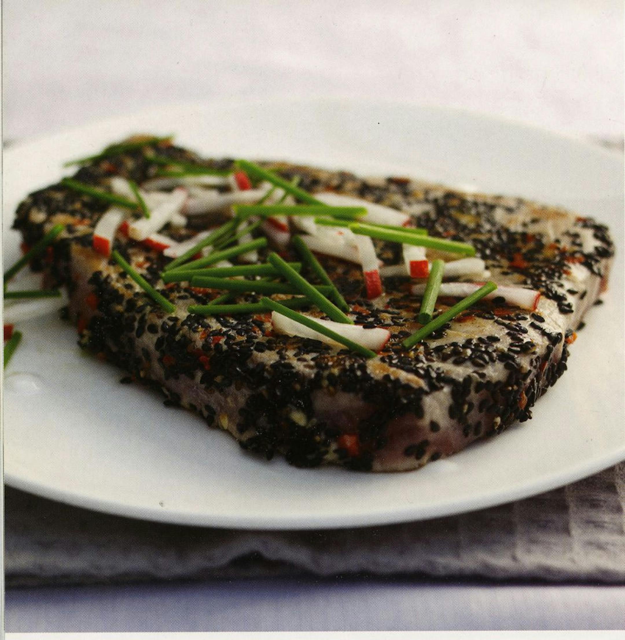 Black sesame seeds help make tuna steaks a striking dish.