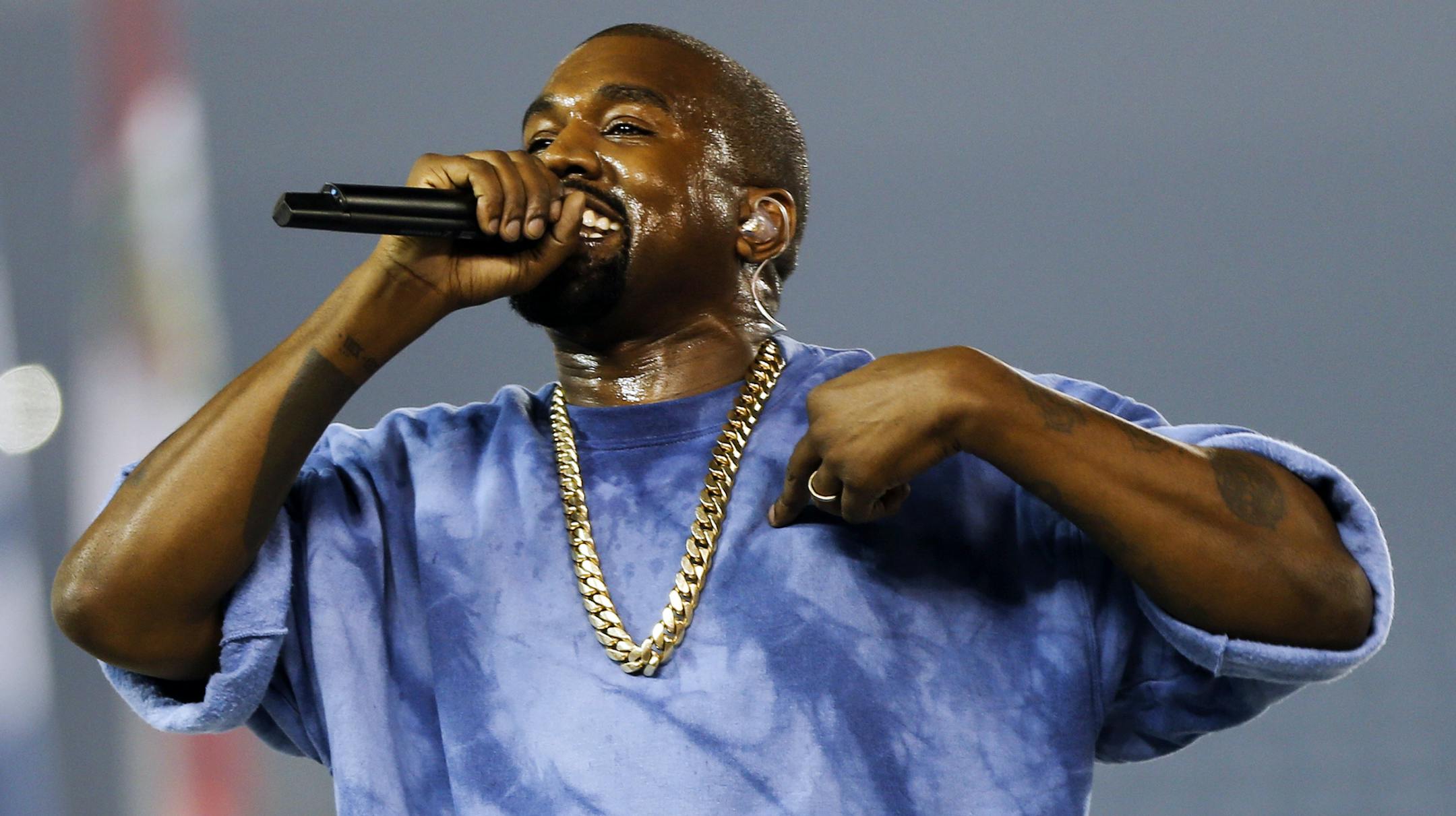 FILE - In this July 26, 2015, file photo, Kanye West performs during the closing ceremony of the Pan Am Games in Toronto. Kanye West, Beck, the Strokes and the Killers are set to perform at the three-day 2016 Governors Ball Music Festival in June. (AP Photo/Julio Cortez, File)