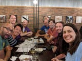 Michael Hewitt (third from right, orange shirt) hangs out with Effective Altruism practitioners at a local Meetup event.