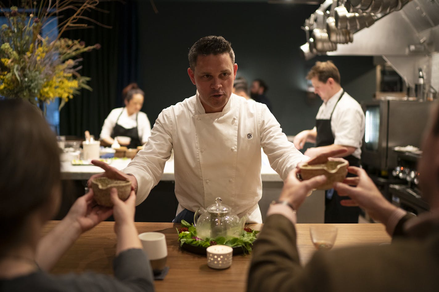 After telling the story of the first course's origin, Demi Owner/Chef Gavin Kaysen handed bowls of bacon, pea, and mint broth to patrons Wednesday night. ] JEFF WHEELER &#x2022; jeff.wheeler@startribune.com Gavin Kaysen's new restaurant, Demi, has opened in the North Loop. The remarkable, standard-setting restaurant was photographed during dinner service Wednesday evening, May 8, 2019 in Minneapolis.