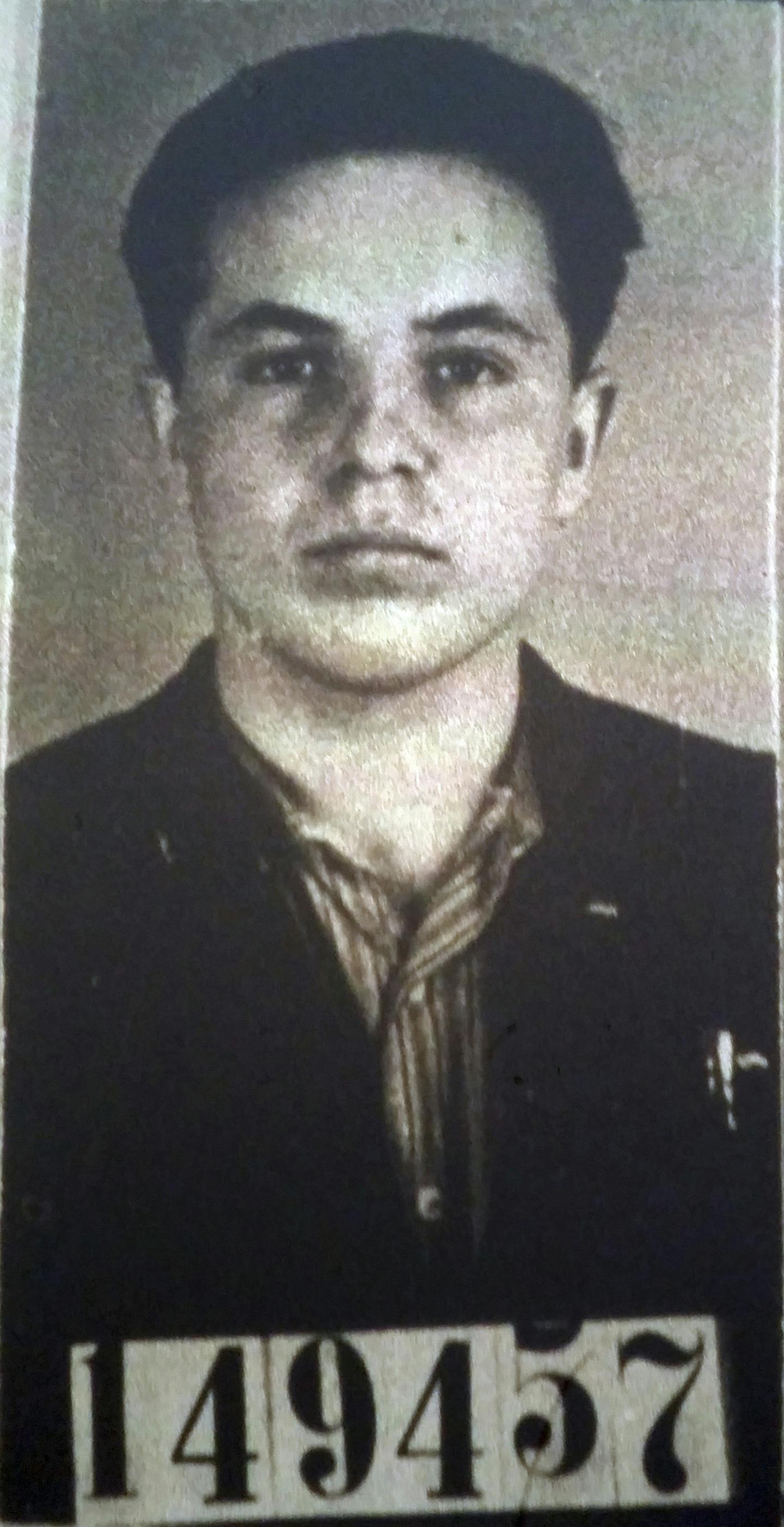 FILE - This Undated file photo of Michael Karkoc was part of his application for German citizenship filed with the Nazi SS-run immigration office on Feb. 14, 1940. Polish prosecutors say American authorities are moving ahead with their request to extradite a 99-year-old Minnesota man to be tried on allegations he was involved in a World War II massacre of civilians. (AP Photo/U.S. National Archives, File)