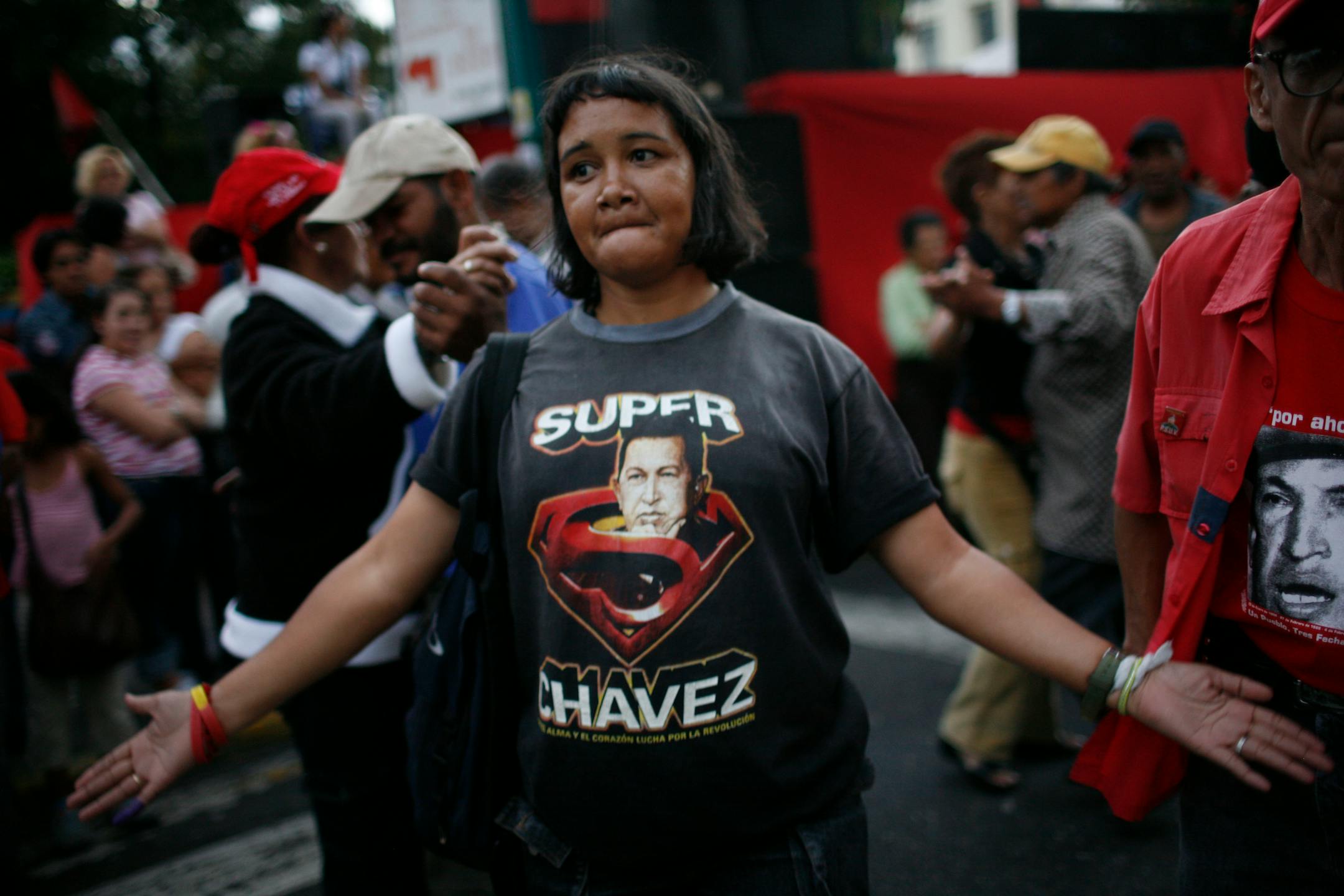 A supporter of Venezuela's President Hugo Chavez wears a T-shirt that reads "Super Chavez" in Caracas, Sunday, Dec. 2, 2007. Venezuelans went to the polls Sunday in a referendum, called by Chavez's government, on major changes to their constitution, including removing presidential term limits and expanding presidential powers.