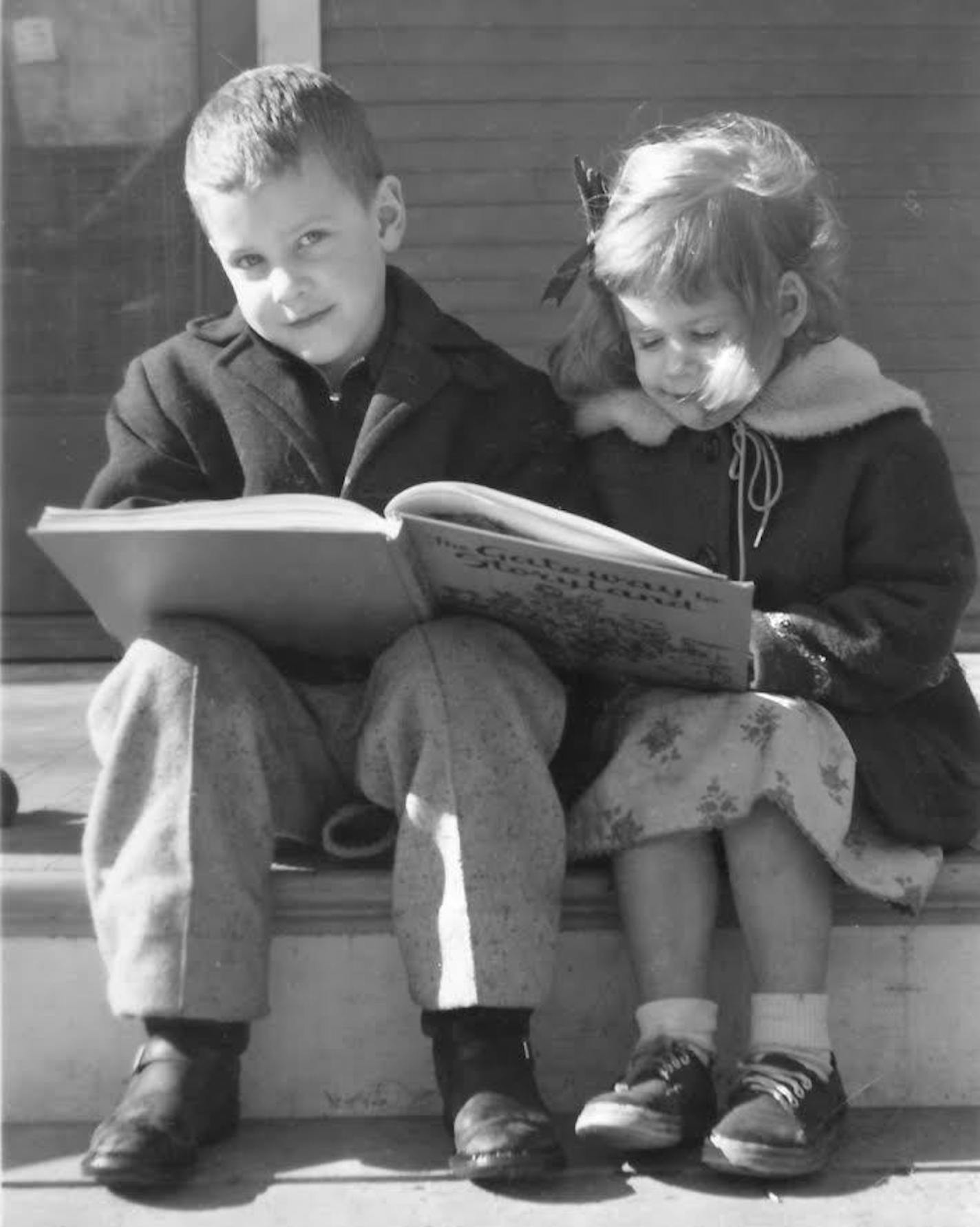 Laurie Hertzel and her big brother David read on the front porch of their home in Duluth in the early 1960s.