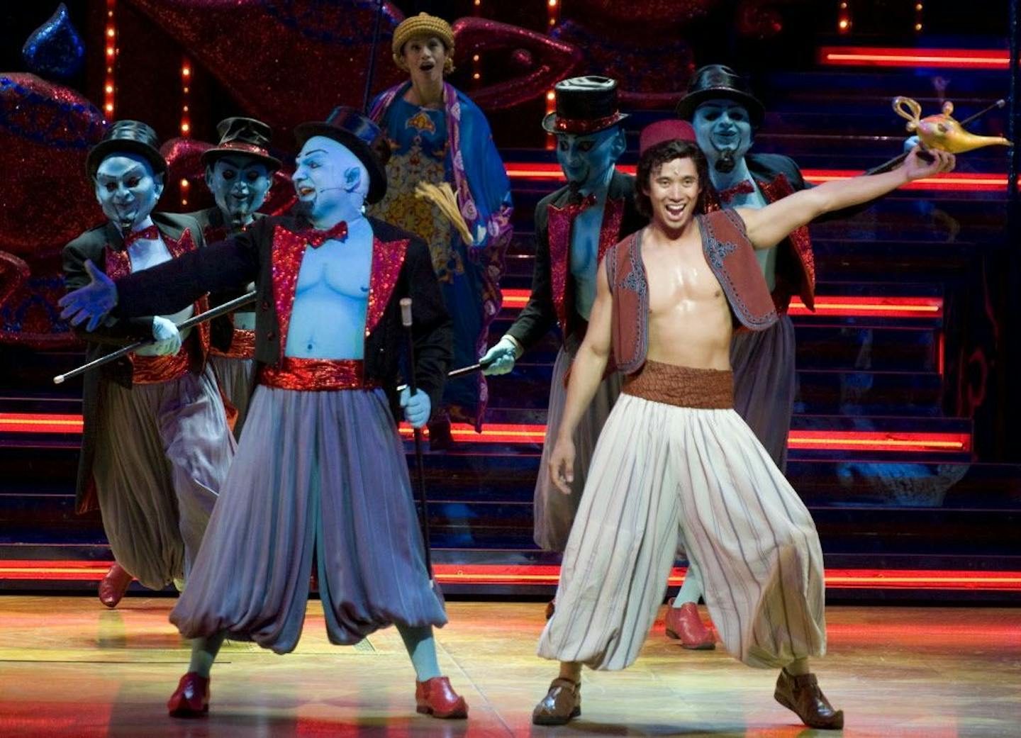 FILE - In this June 23, 2010 file photo, Aladdin and Genie perform in "Aladdin - A Musical Spectacular" at Disney's California Adventure park in Anaheim, Calif.