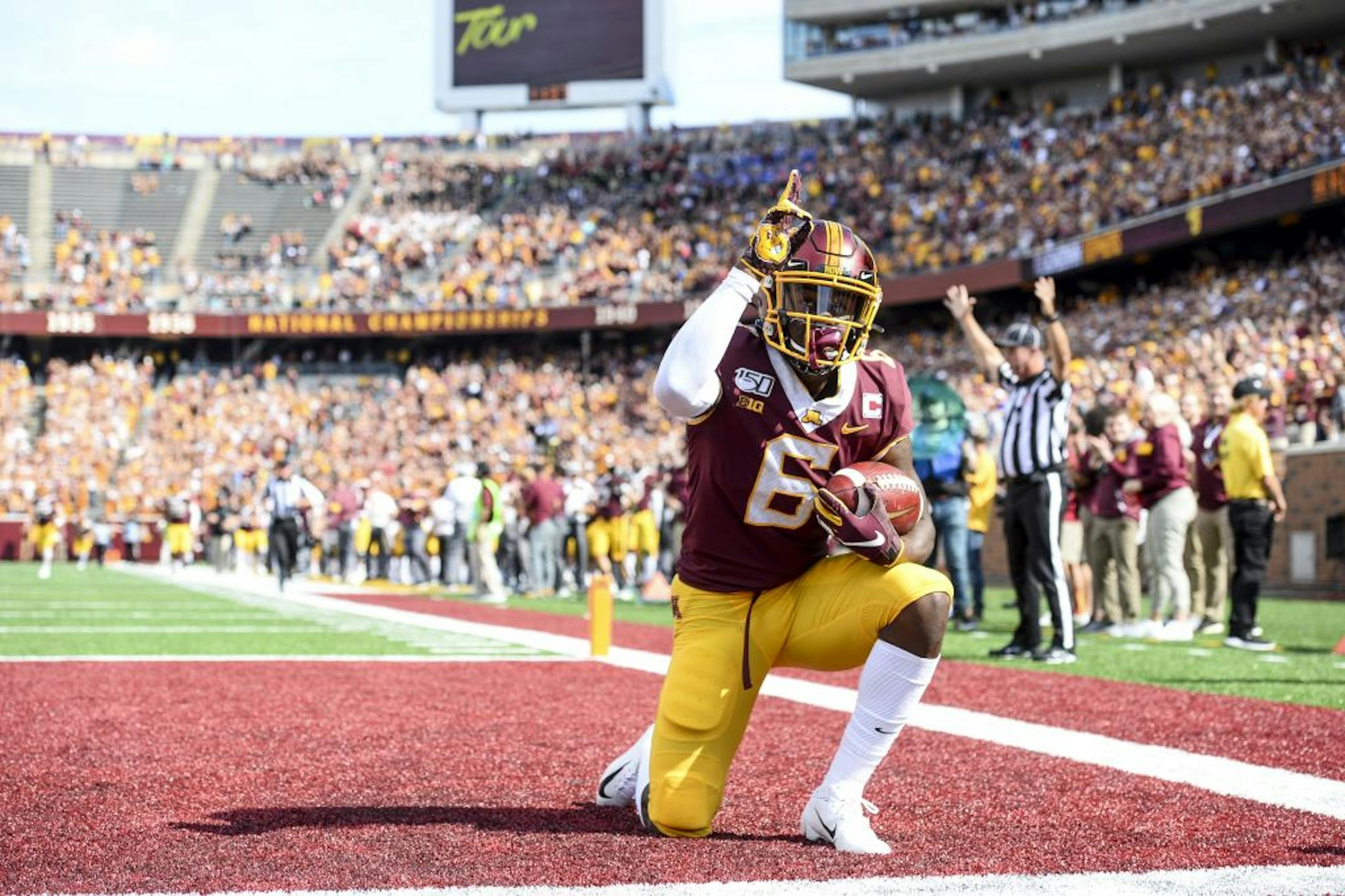 Gophers wide receiver Tyler Johnson (6) celebrated his first touchdown against Georgia Southern.