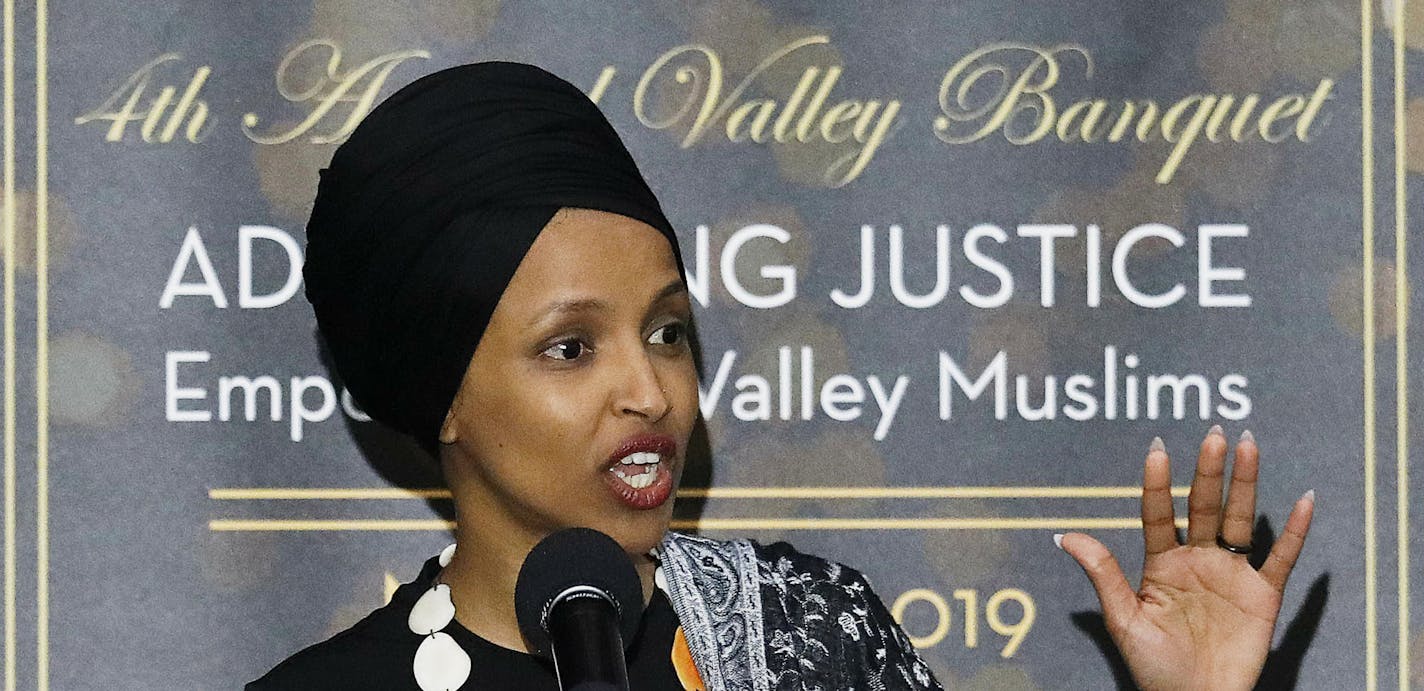 In this March 23, 2019, photo, Rep. Ilhan Omar, D-Minn., speaks at a dinner banquet, part of a fundraising event for the Council of American-Islamic Relations of Greater Los Angeles at the Hilton hotel in Woodland Hills, Calif. Hundreds of protesters rallied outside the event where the congresswoman spoke to the Muslim-American civil rights group. Omar has drawn criticism for her recent remarks on Israel, including comments that American supporters of Israel are pushing people to have "allegianc