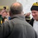 Former Green Bay Packers and Minnesota Vikings quarterback Brett Favre arrives to the glee of fans before posing with fans for photos and signing auto