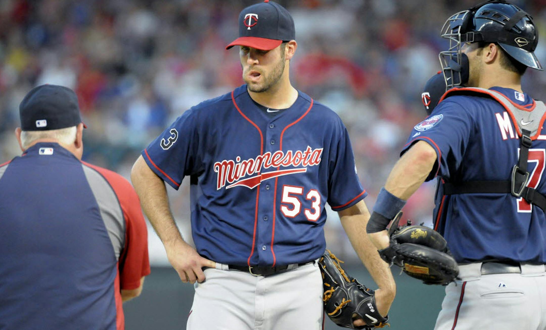 Minnesota starter Nick Blackburn (53) is pulled from the game in the bottom of the third inning.