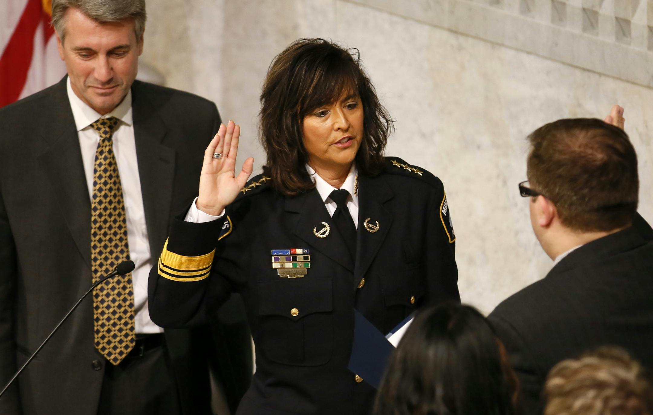 New Minneapolis Police Chief Janee Harteau was swarn in Tuesday afternoon in the City Hall Routunda.