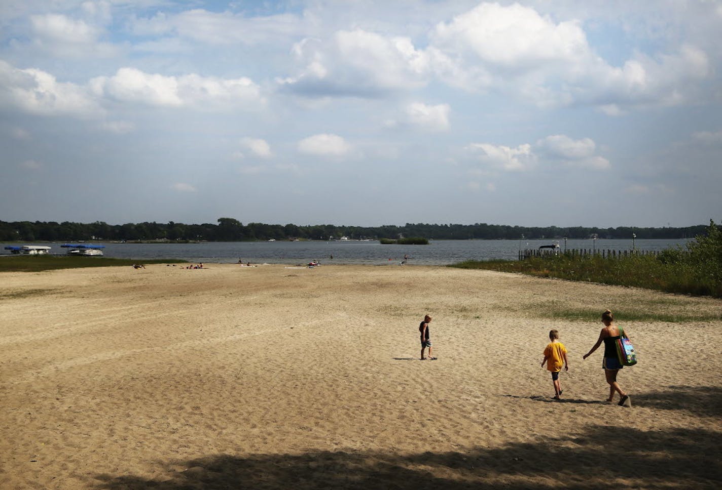 Lake levels on White Bear Lake were receding in 2013, as shown in the photo. Recent downpours have helped to replenish the lake.